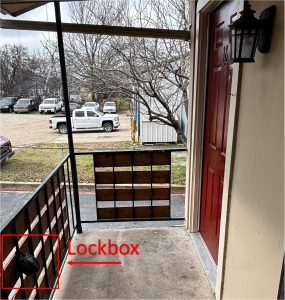 a door that is open in front of a house